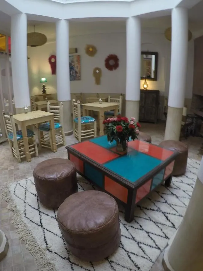Low seating and leather poufs in the salon